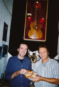 T & Shane breaking bread, with the hallowed Hofner (?) guitar Willie Brady played.